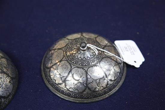 A Indian silver-inlaid Bidri ware magic bowl and cover (abkhwura), Deccan, late 18th/early 19th century, diameter 5.1in.